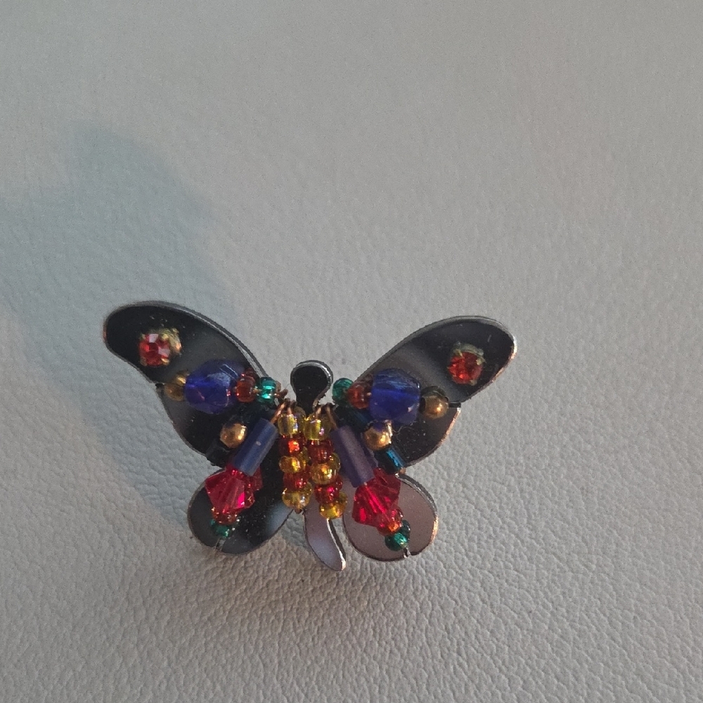Red and Silver Butterfly Brooch with Intricate Wing Patterns